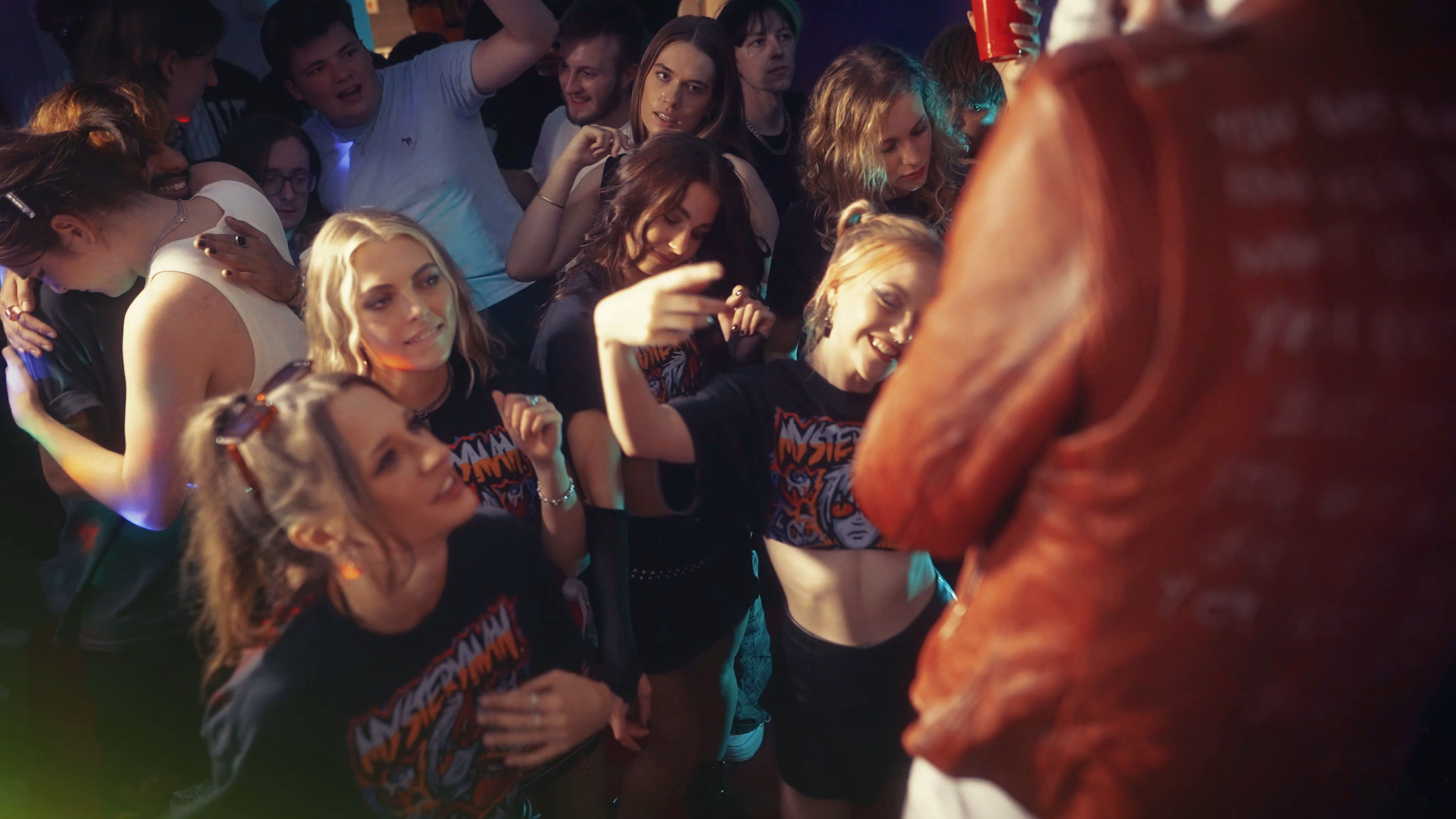 Crowd looking towards Mystery Man during the performance