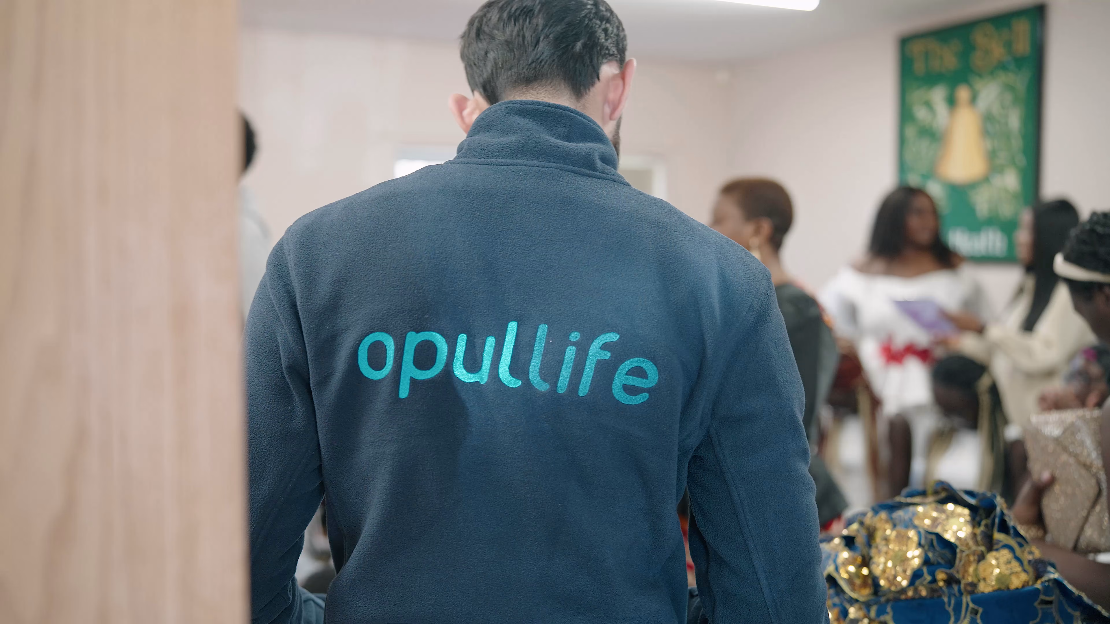 Opul Life branded uniform photographed during community outreach