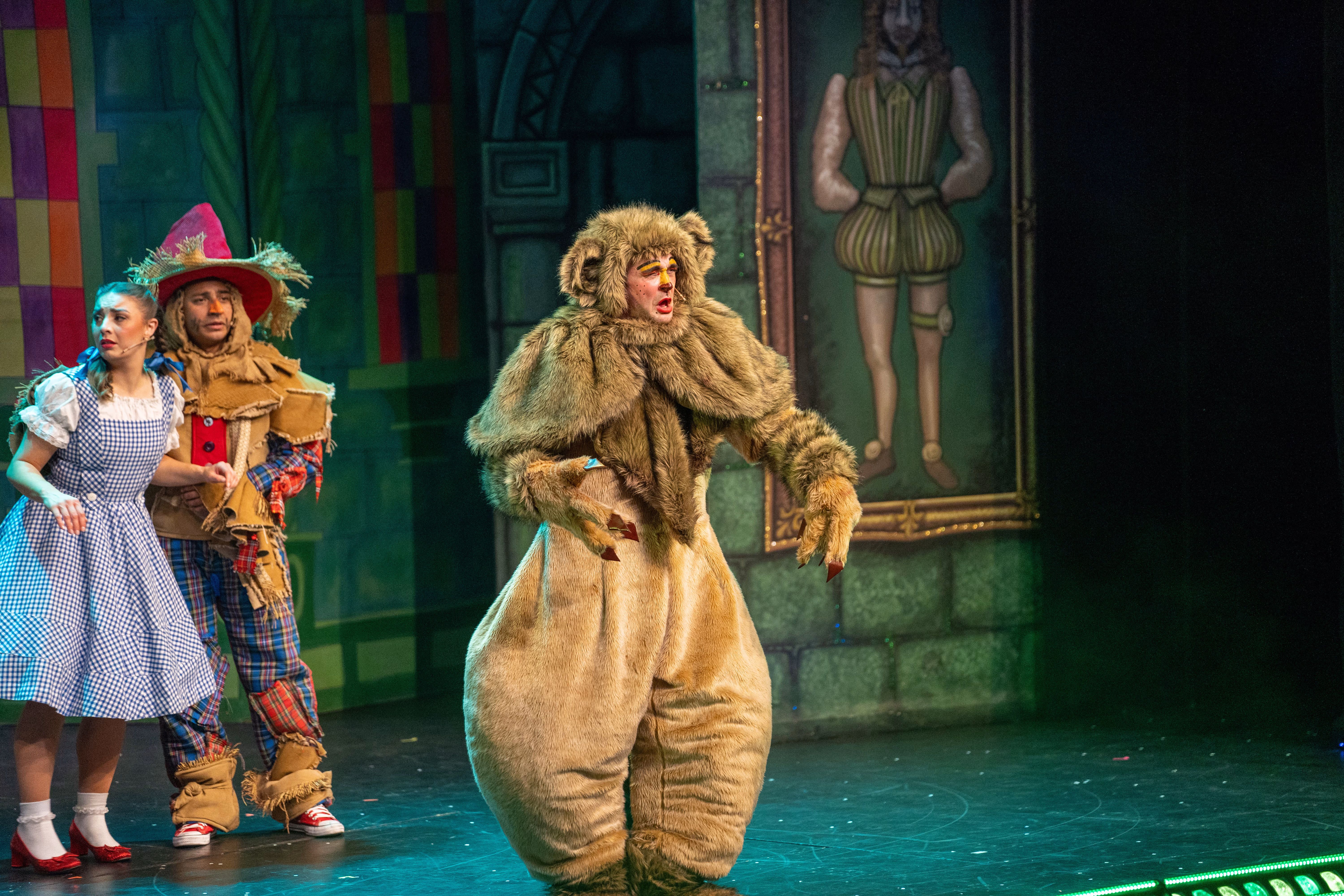 Dorothy, the Scarecrow and the Cowardly Lion on stage