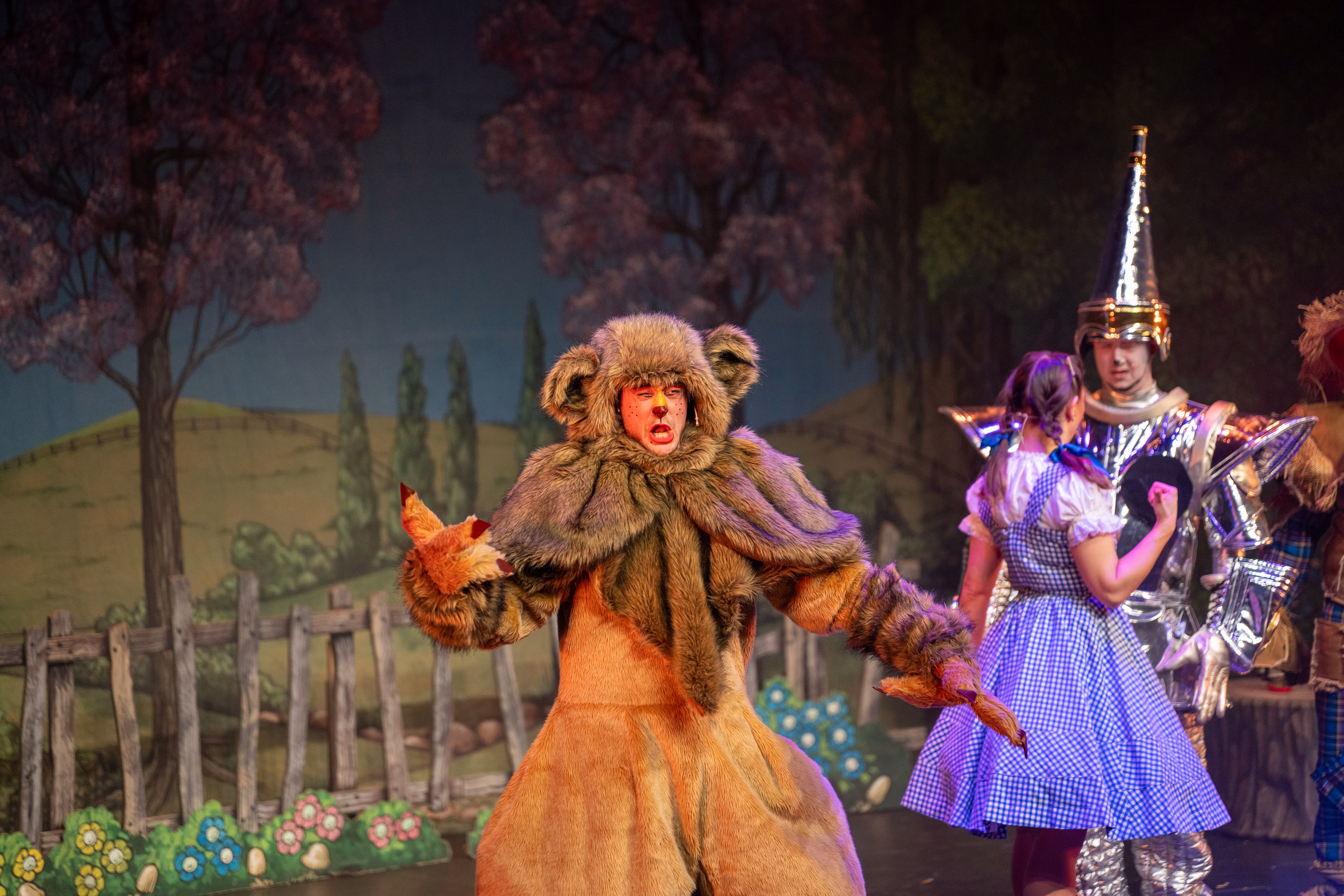 Dorothy, the Tin Man and the Cowardly Lion in The Wizard of Oz