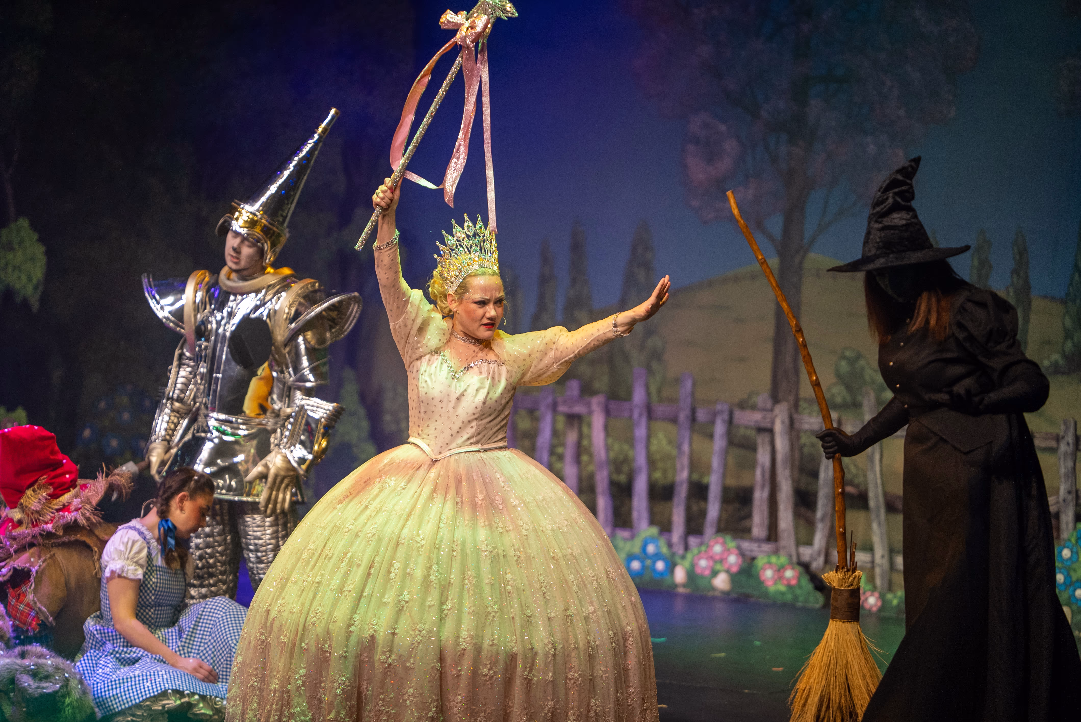 Glinda, the Tin Man and the Wicked Witch during The Wizard of Oz