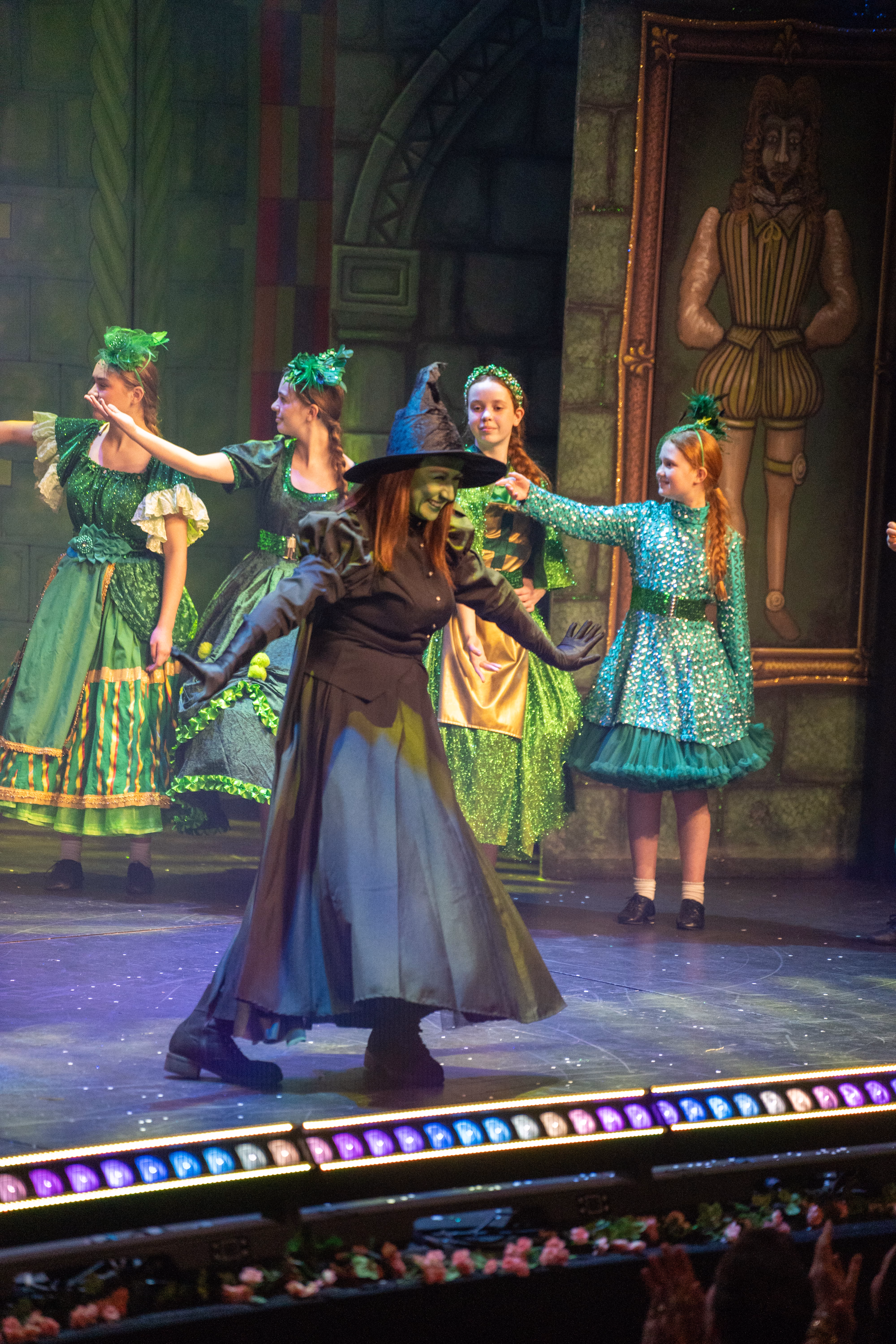 The Wicked Witch and cast during The Wizard of Oz stage performance