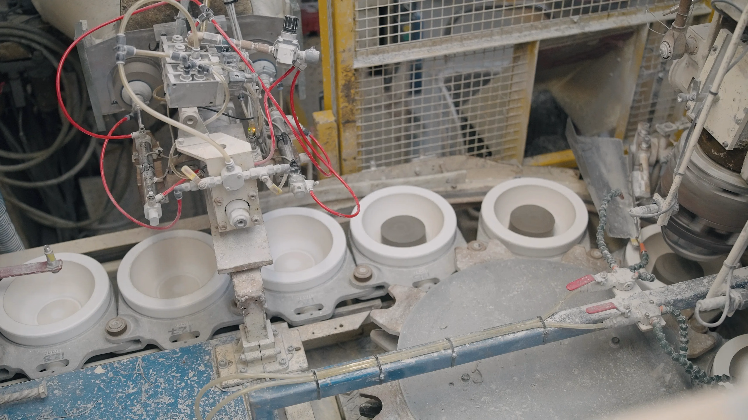 Ceramics moving through production machinery