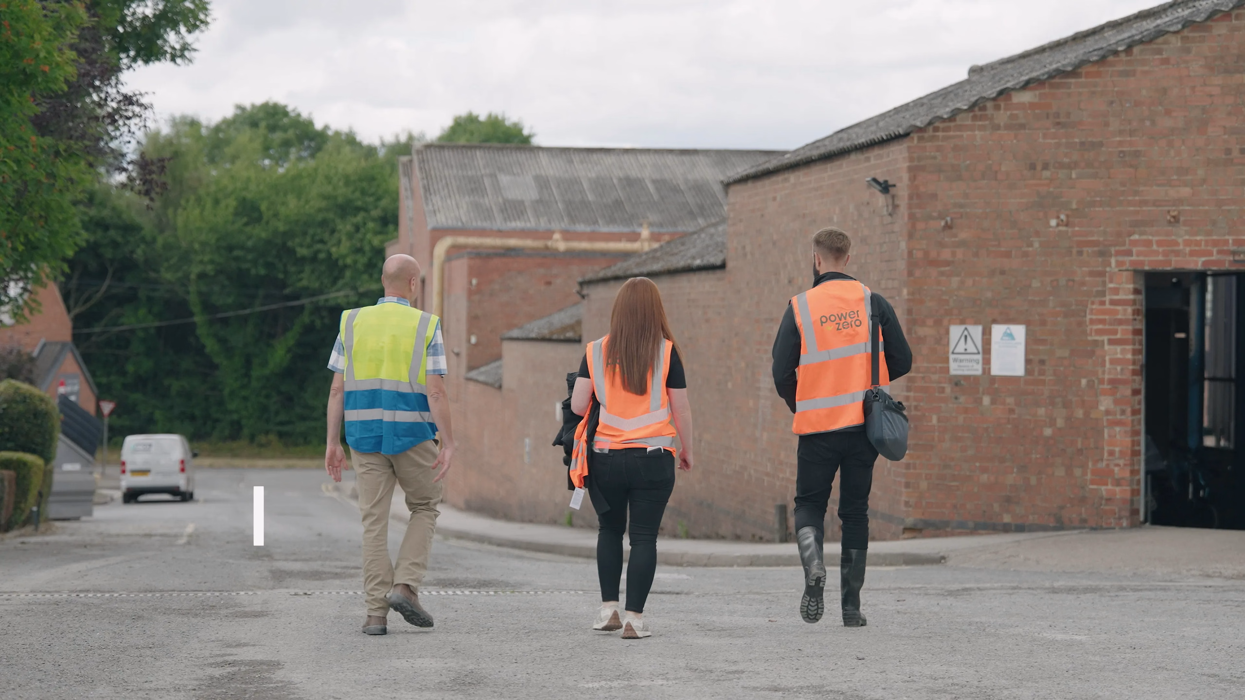 Project team walking into the Denby factory