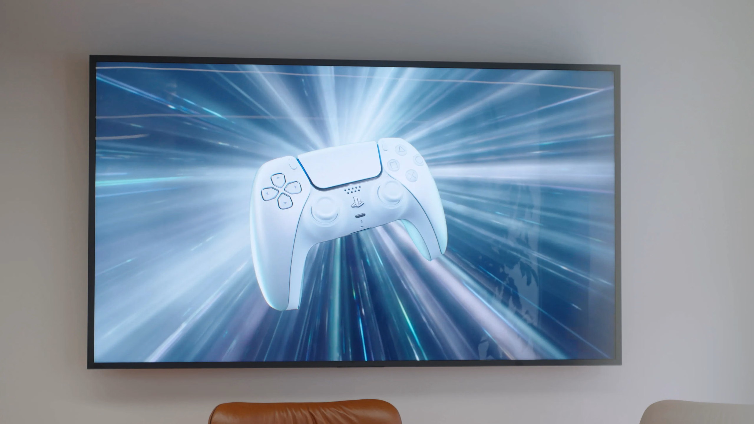 PlayStation controller graphic displayed on a screen at Sony