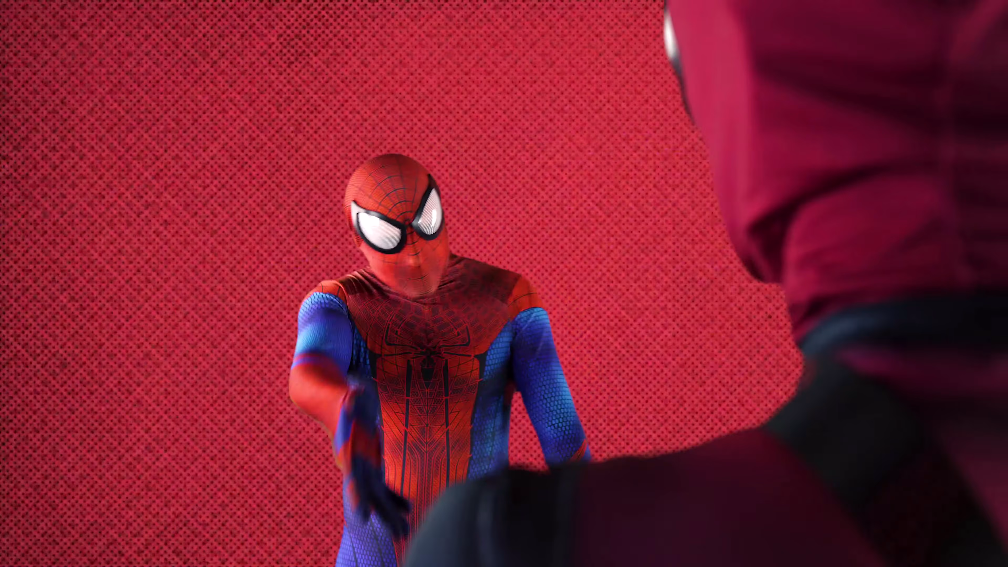 Spider-Man performing towards Deadpool against a red comic panel