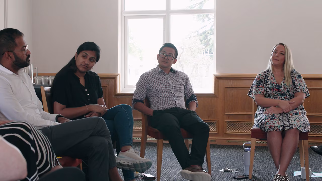 Participants in conversation at a My Home Life England programme