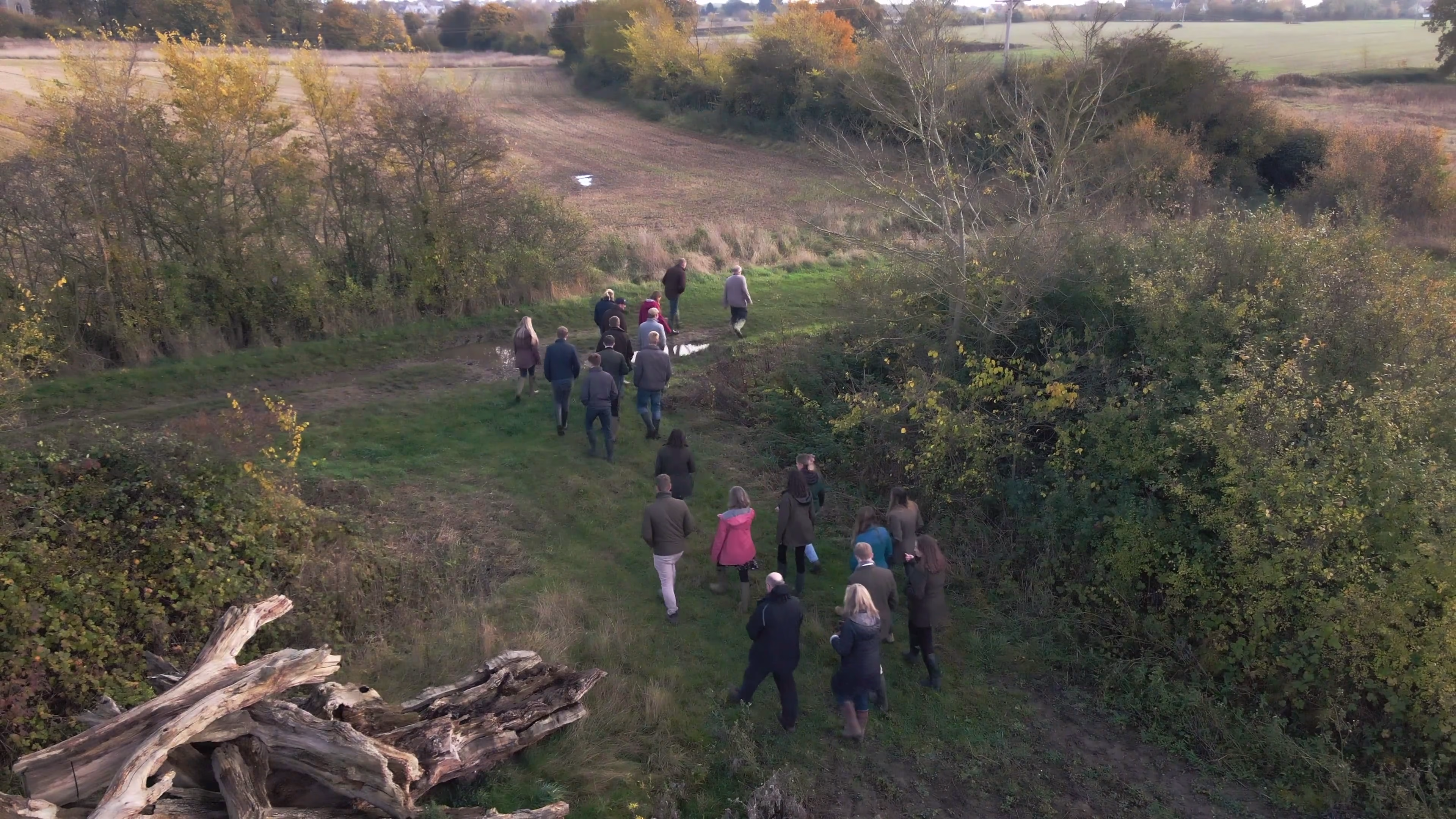 High view of the bursary group crossing the agricultural landscape