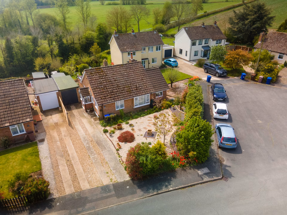 Aerial view of the Cavendish bungalow, drive and neighbouring houses