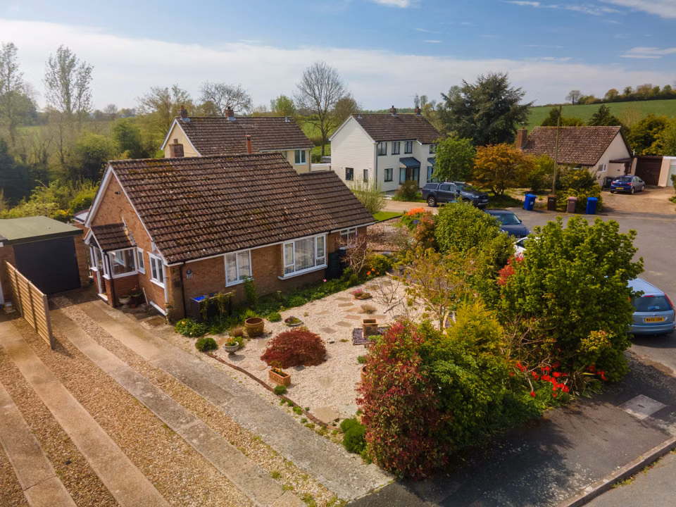 Elevated view across the Cavendish bungalow and its front garden