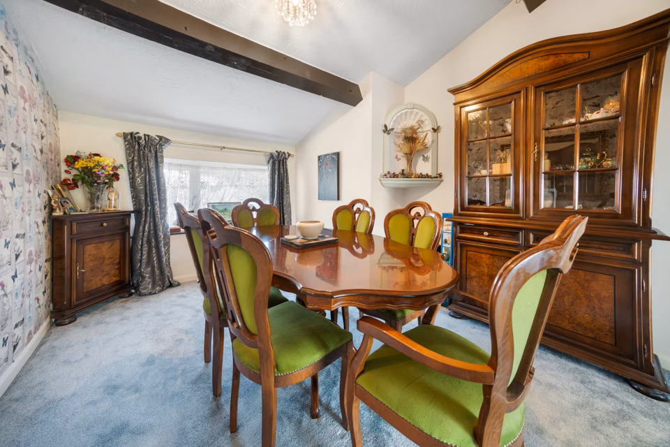 Dining room with a wooden table and display cabinet — 13 Furness Close