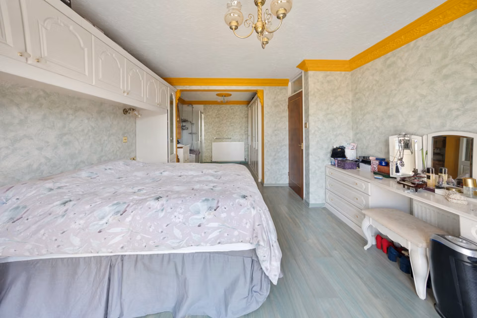 Bed beneath overhead fitted storage — 13 Furness Close