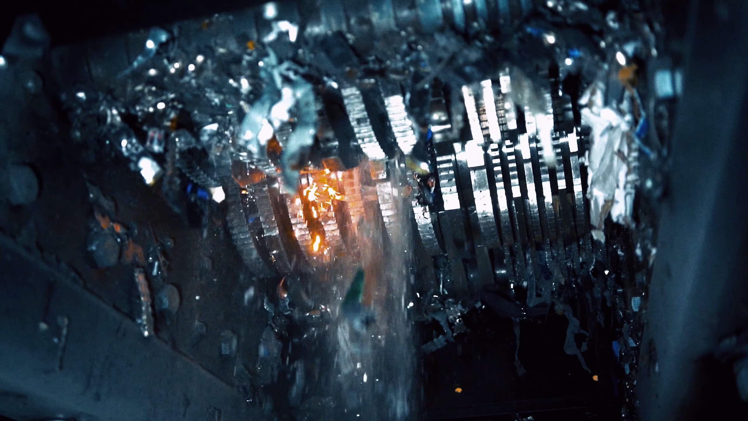 Close view of industrial shredding machinery in the Secure ITAD film.