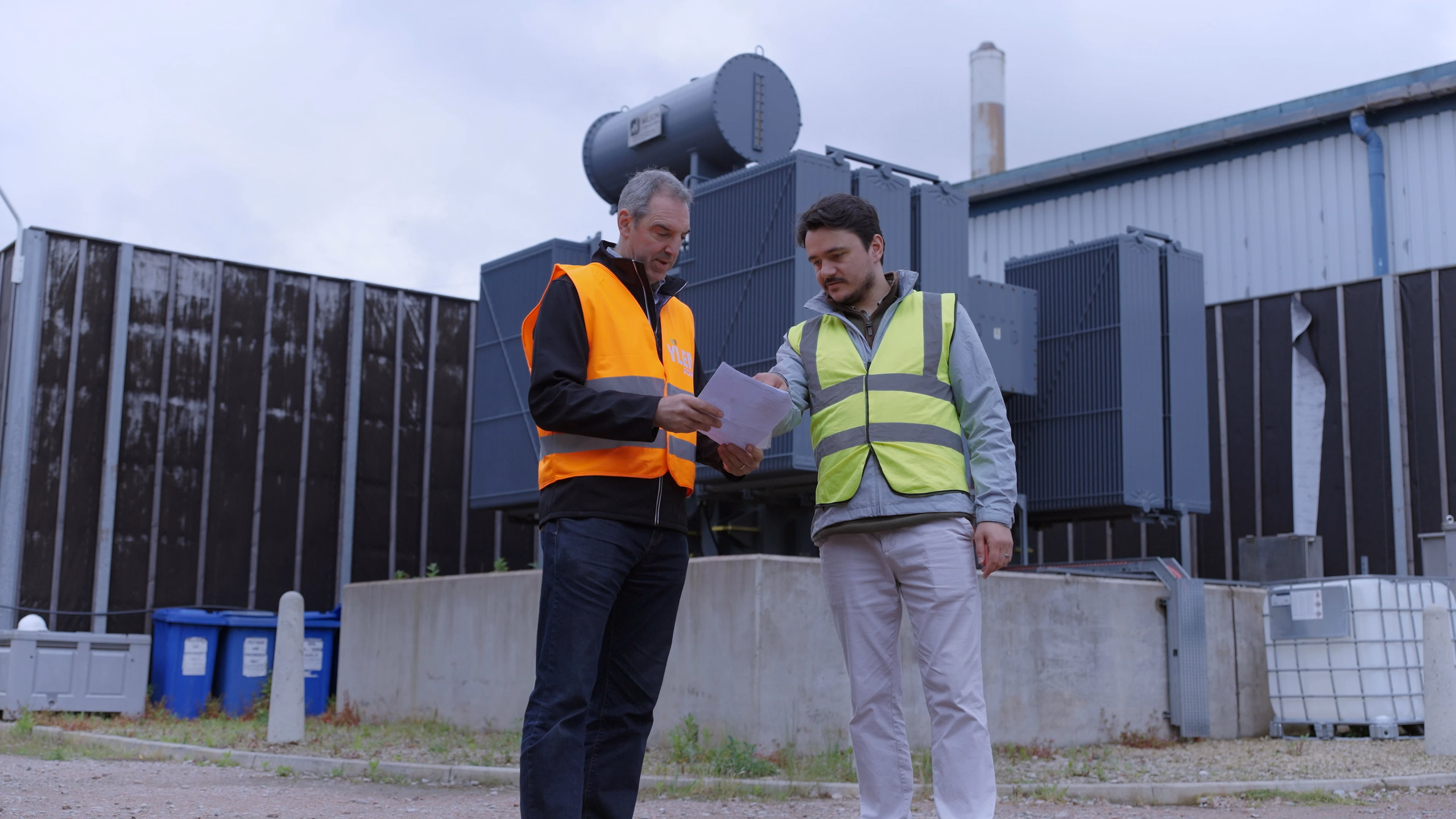 YLEM and Terra Firma representatives discussing power generation equipment at the St Helens site