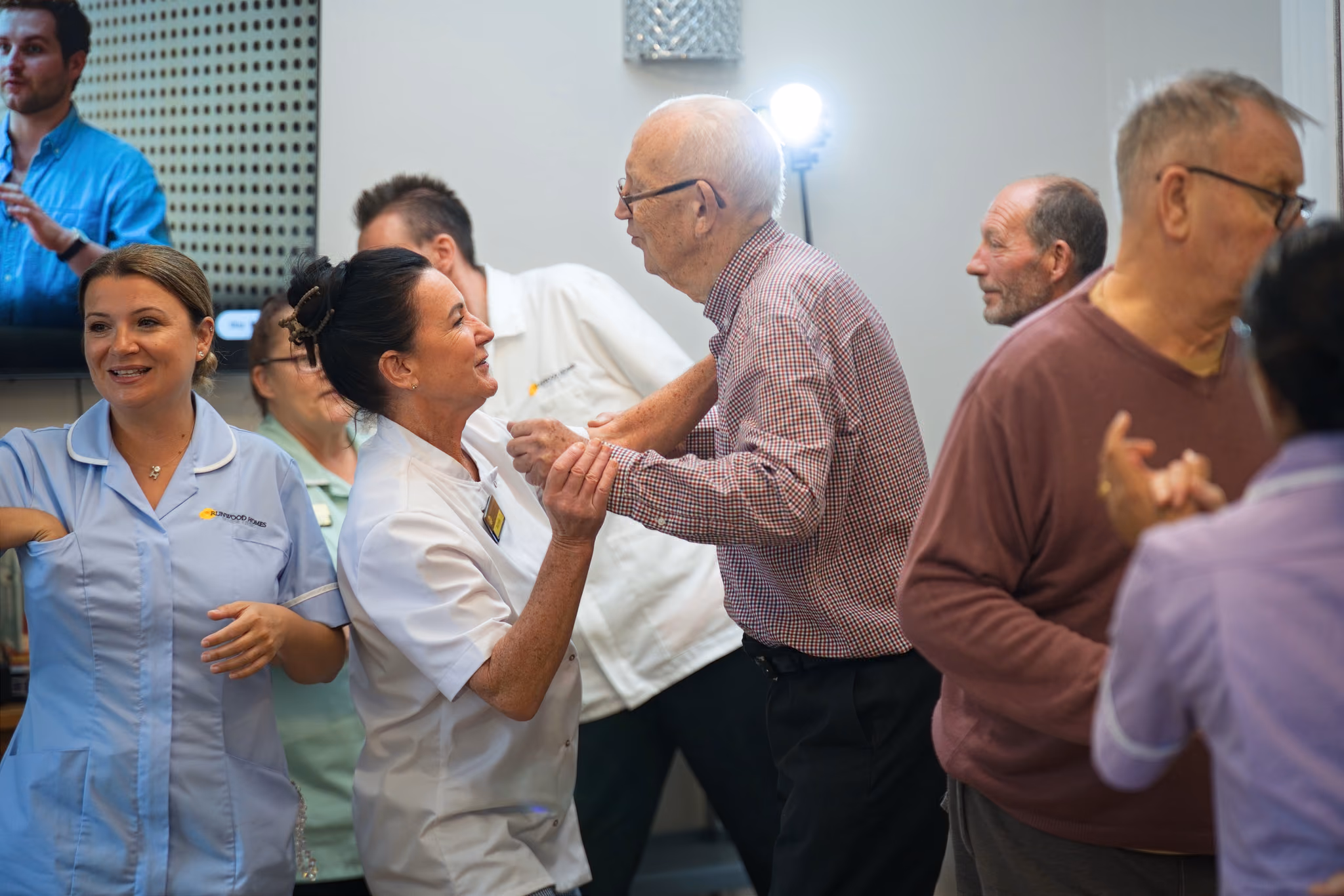 Residents and the Eastham team dancing together