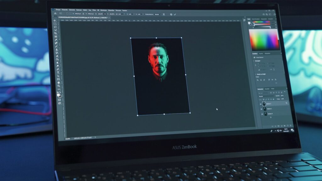 A portrait open in photo editing software on a laptop