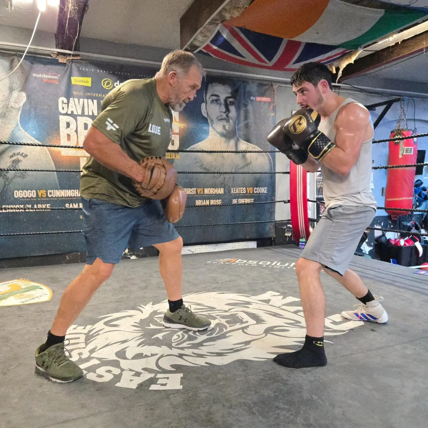 Louie O’Doherty training in the boxing ring with his coach