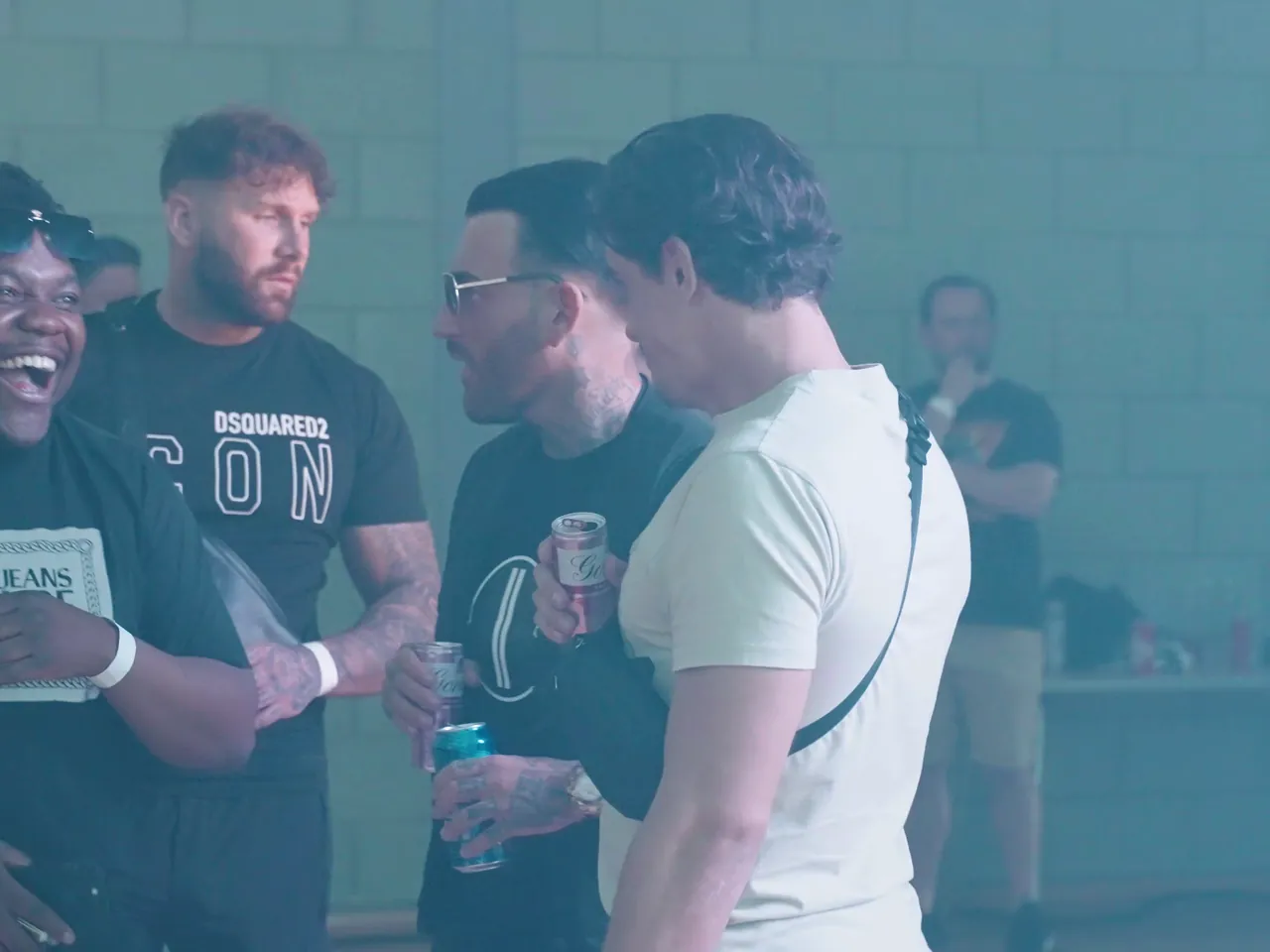 Artist and team talking backstage