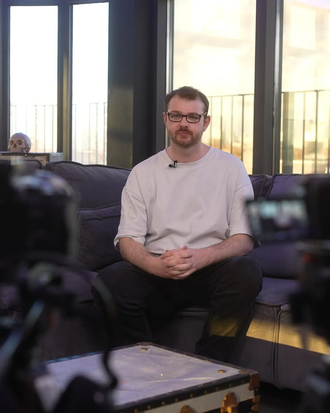 Two cameras set up for a seated interview