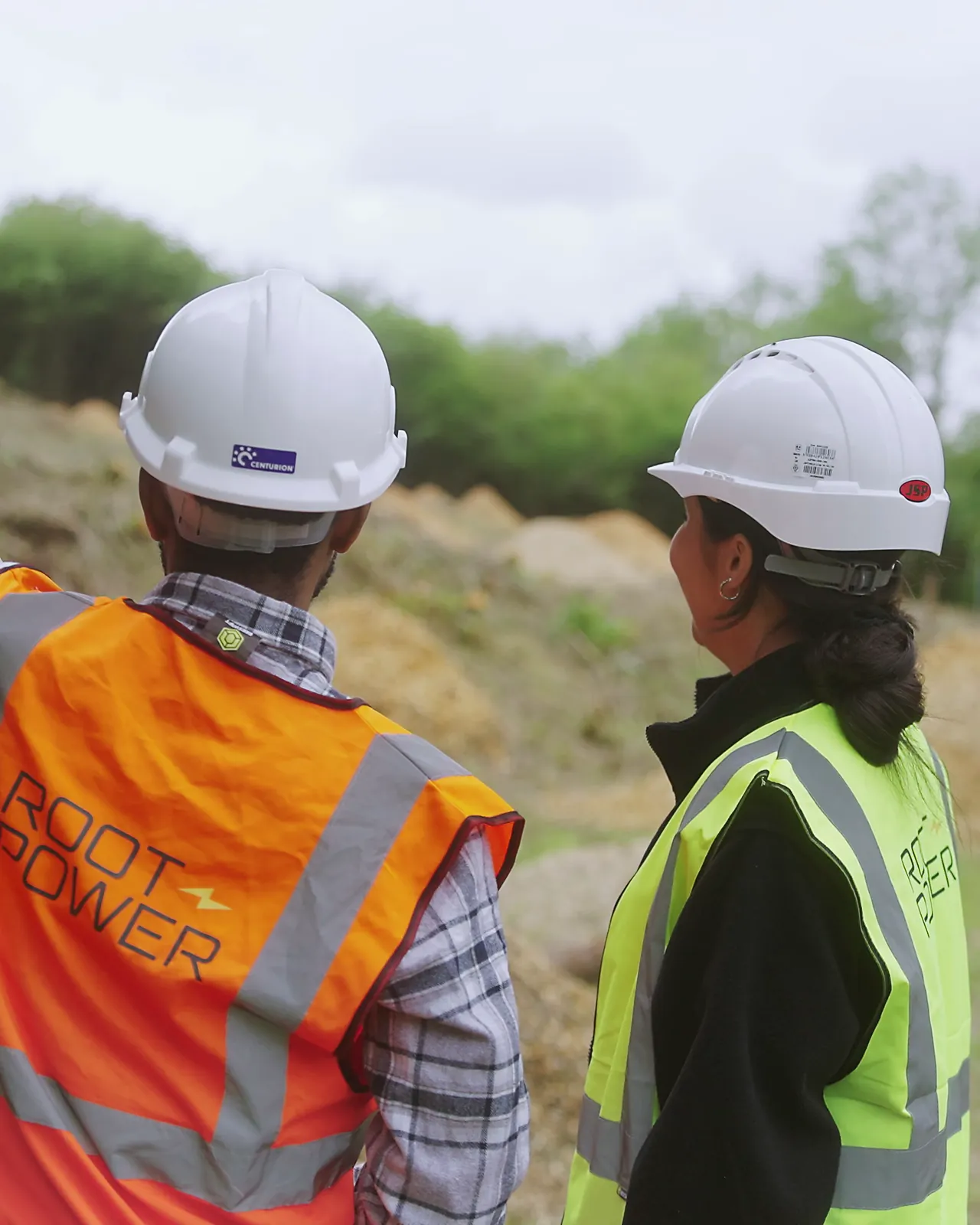 Two team members surveying the ground
