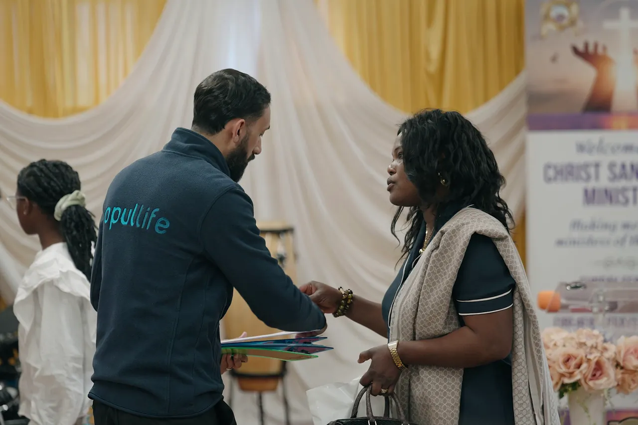 Team member greeting church members