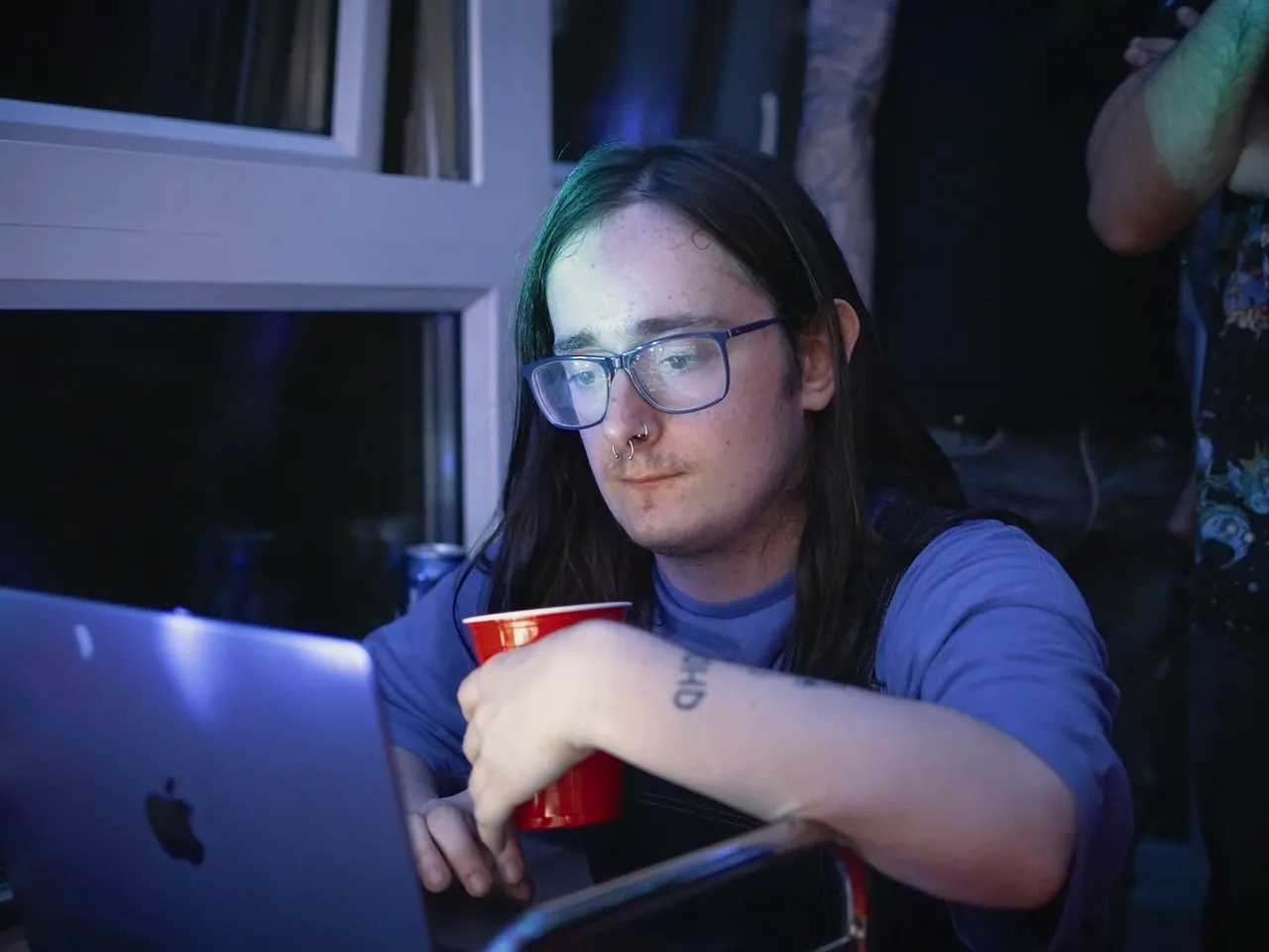 DJ at a laptop at the party