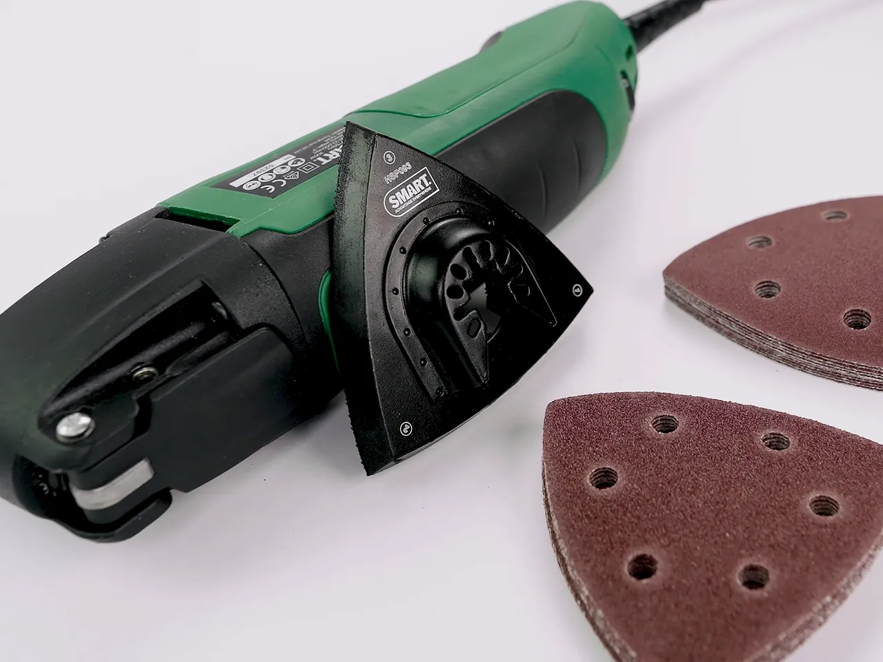Multi-tool with sanding pads in the studio