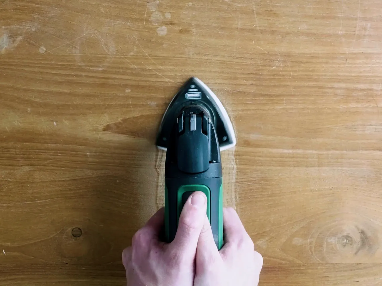 Sanding pale timber from above