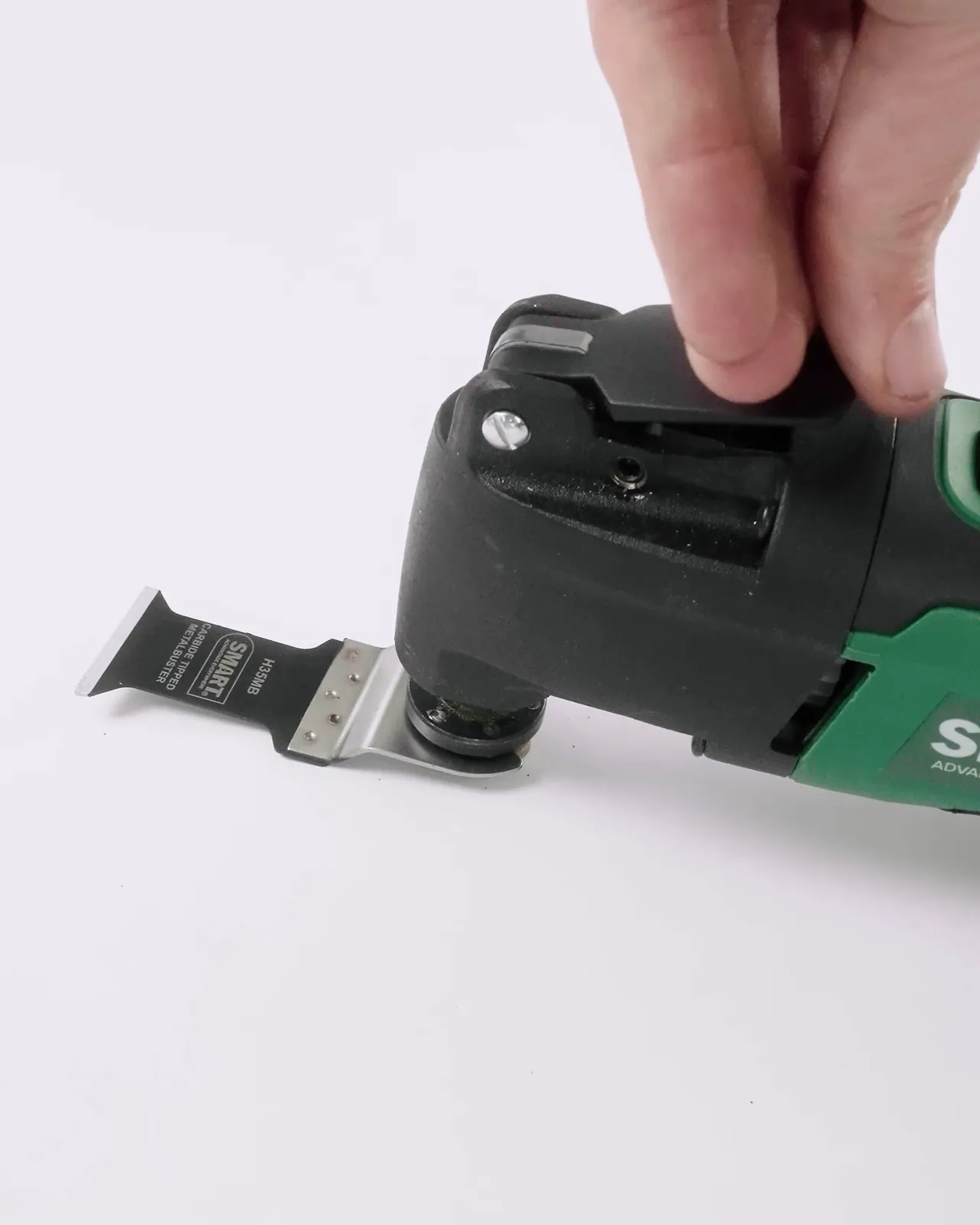 Hands securing the accessory lever