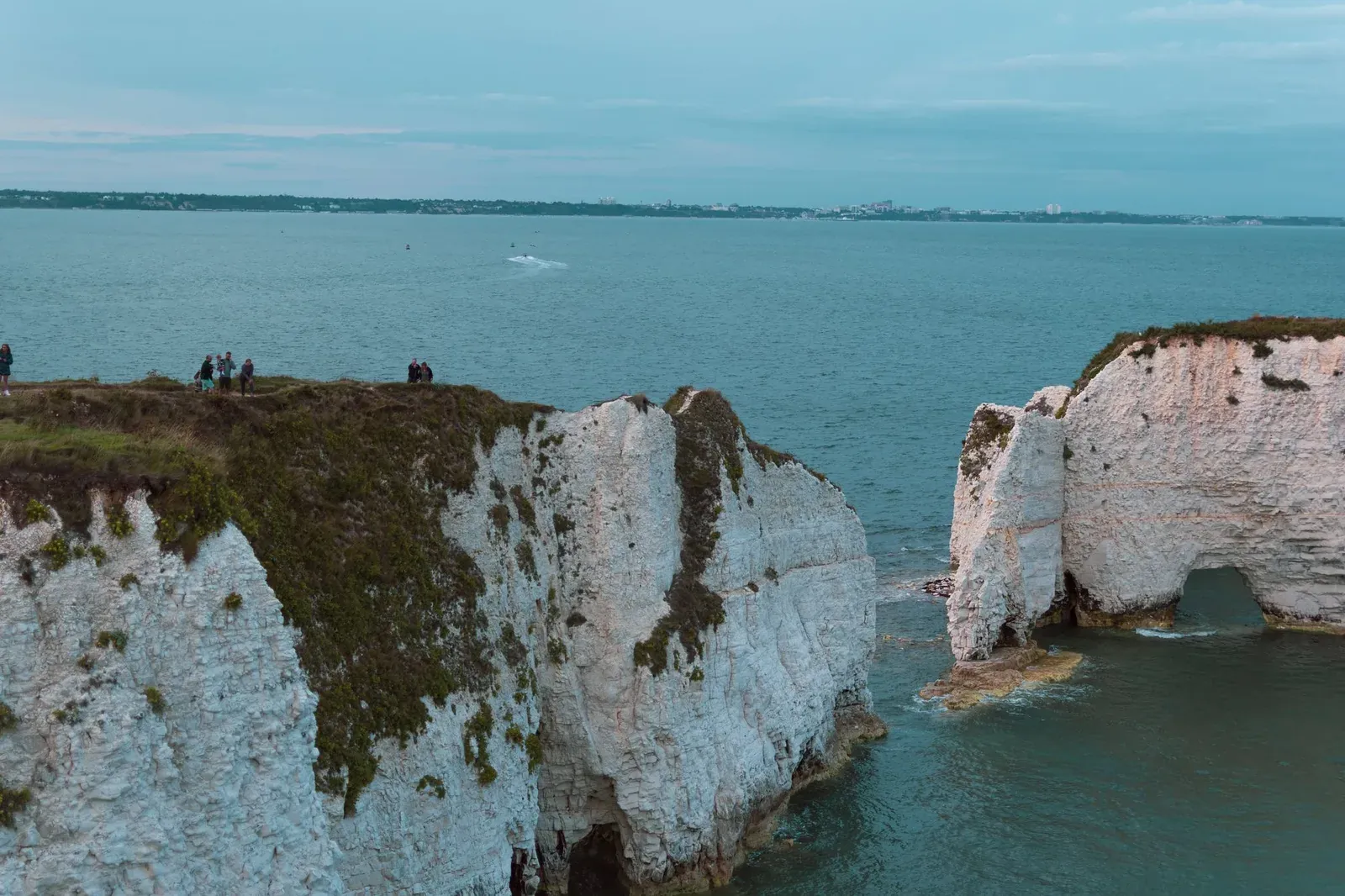 Aerial view of white cliffs and sea