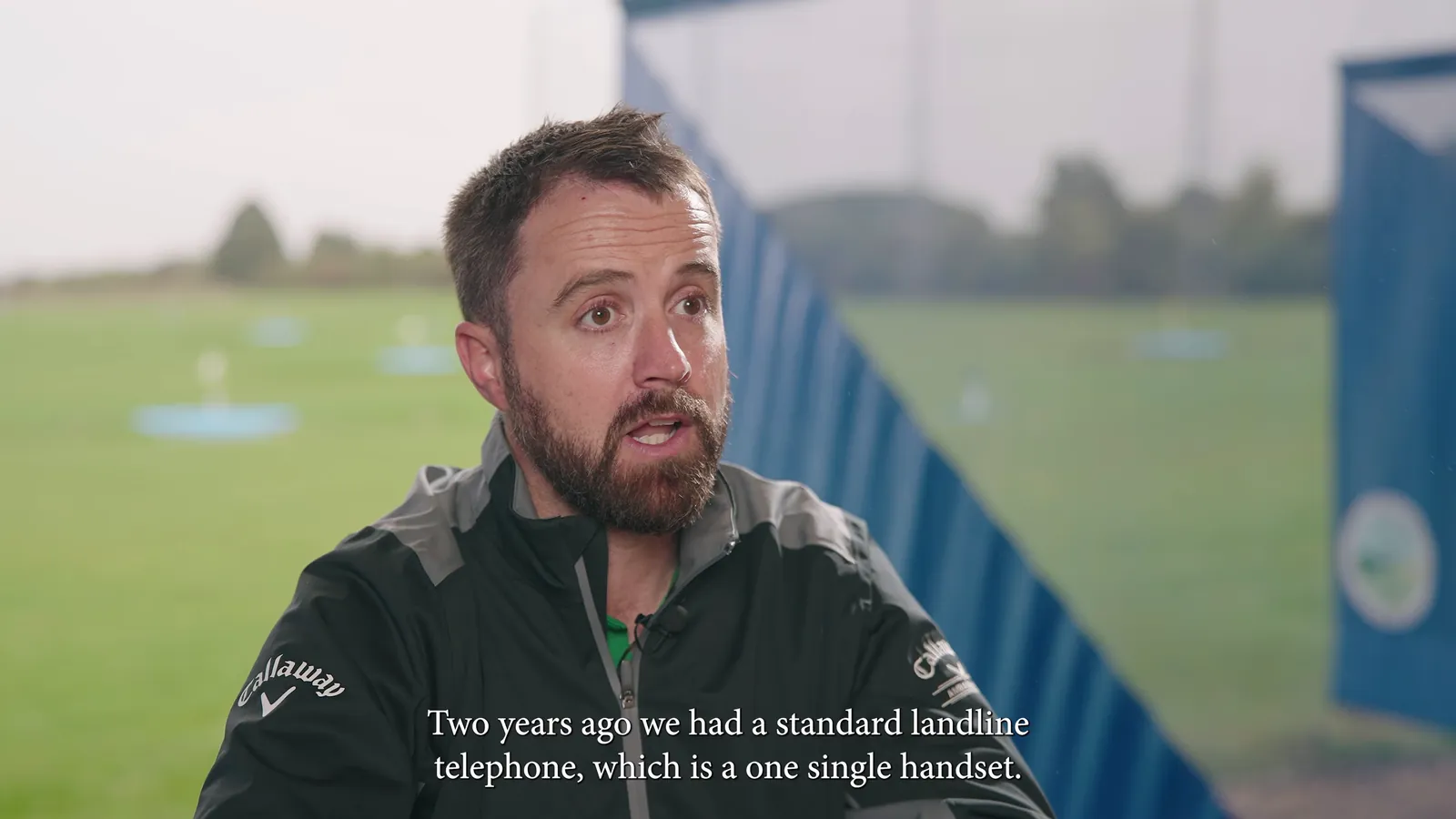 Interview beside a golf range