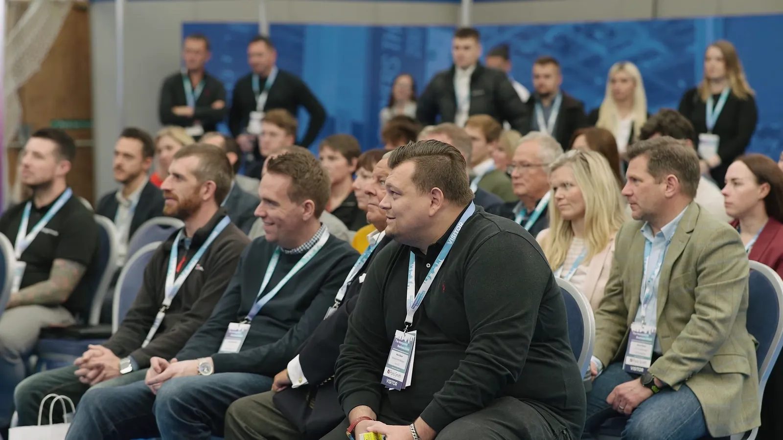 Seated audience listening