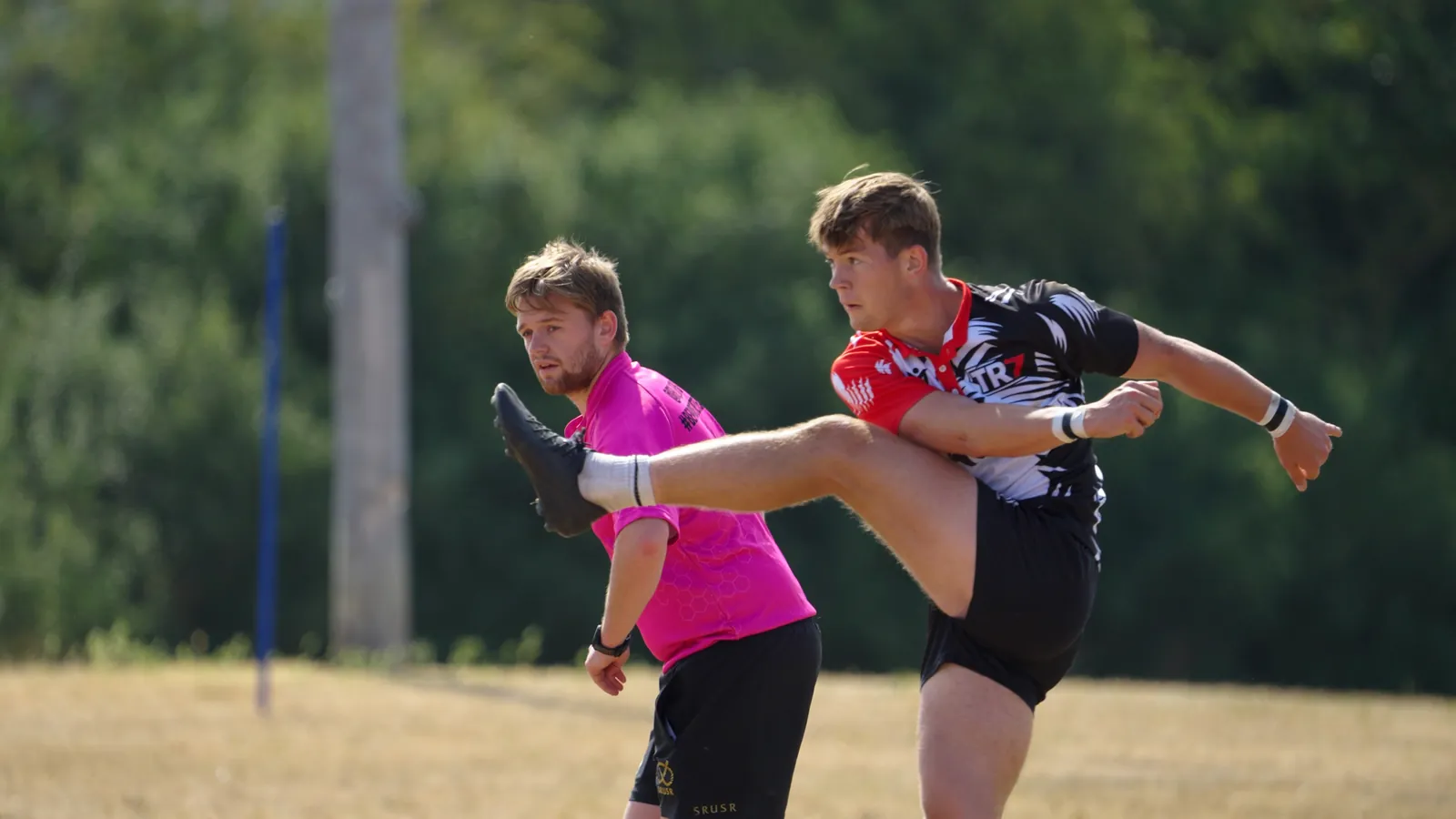 Player kicking the ball