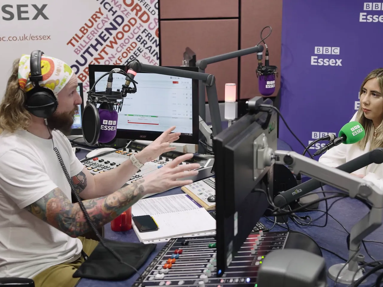 Host and guest across the studio desk