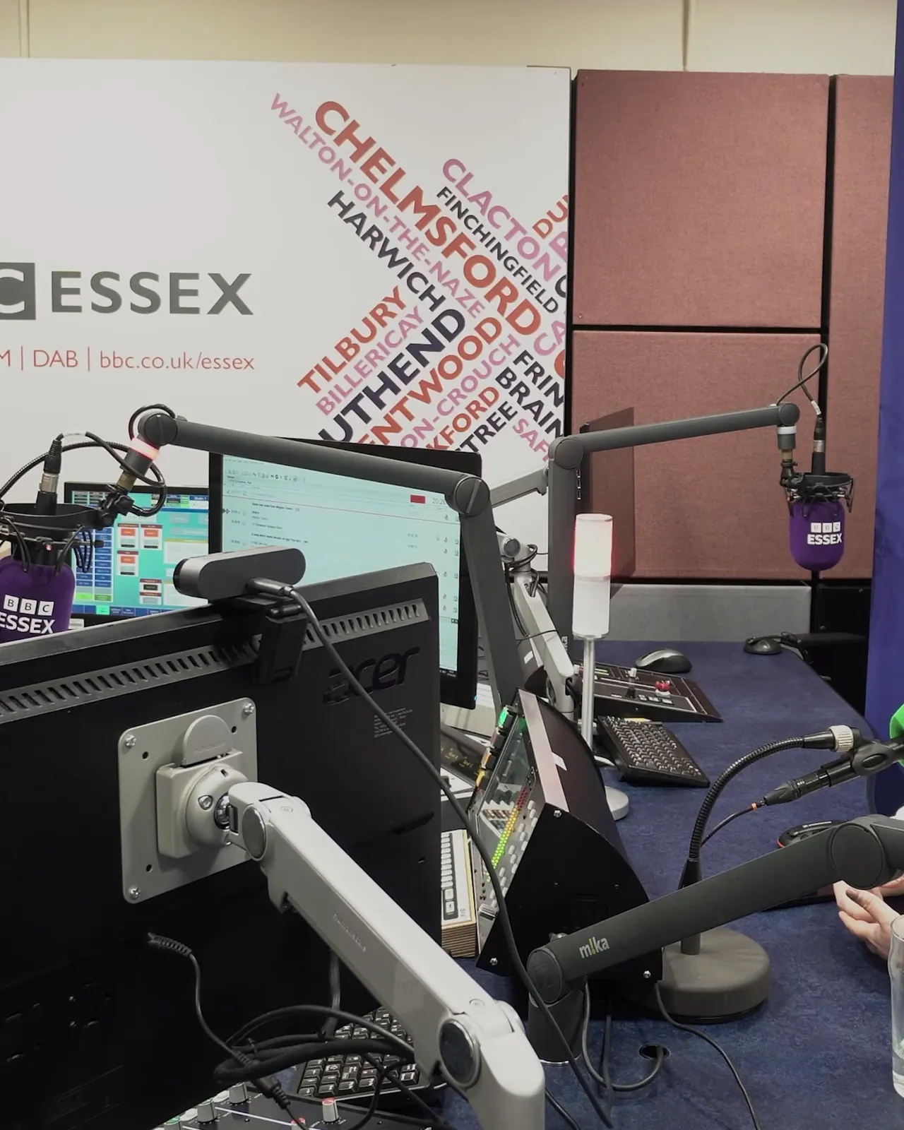 Wide view of host and guest in the studio