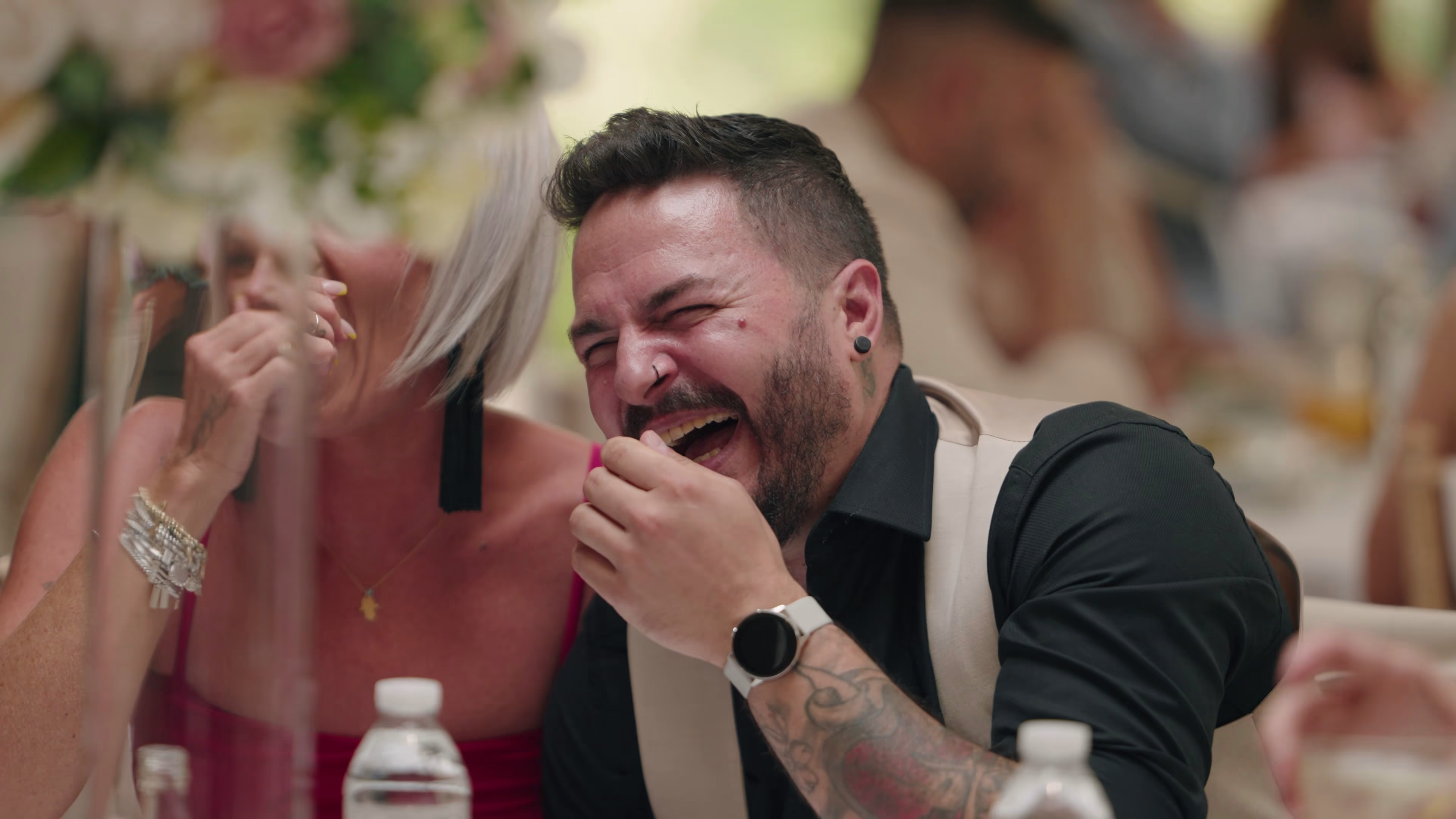 Jake laughing during the wedding speeches