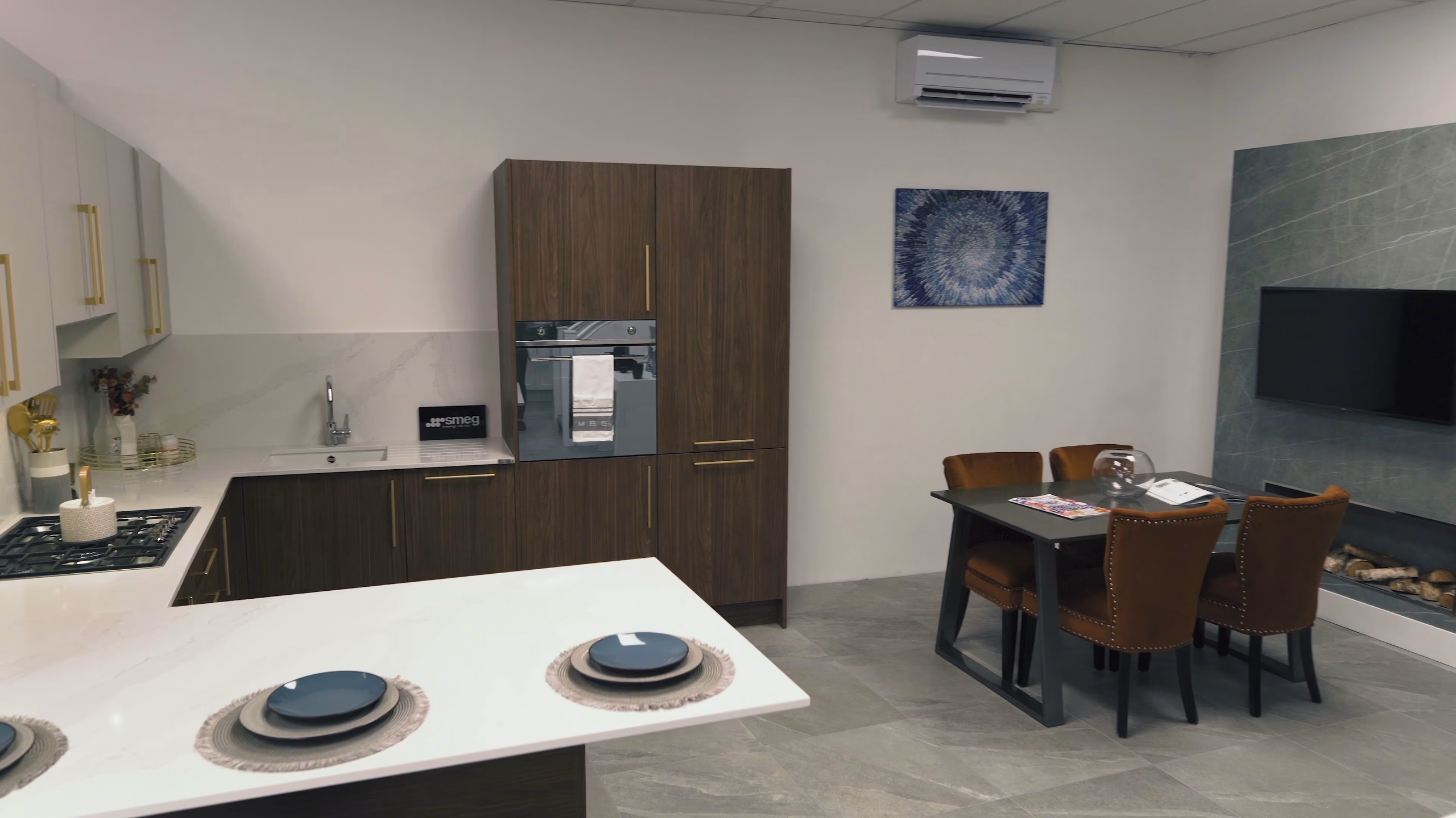 Luxury kitchen and dining display inside the Kesseler Witham showroom