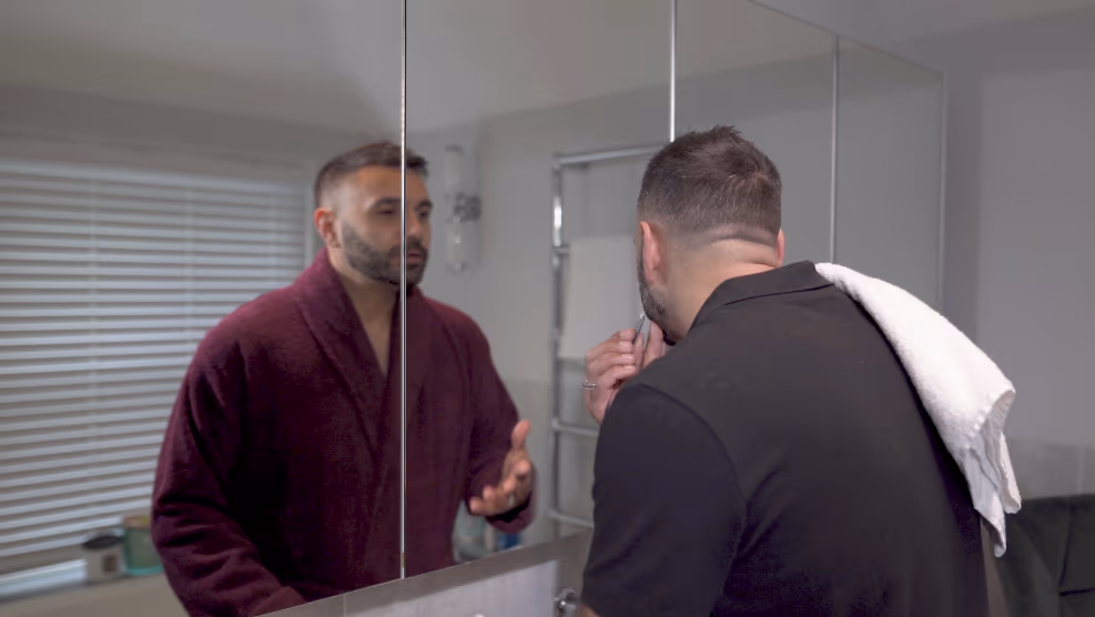 Rotoscoped double performance in the bathroom mirror