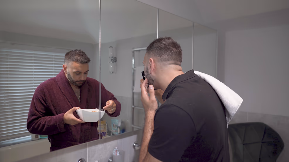 Jake Aldridge performing opposite his mirrored self