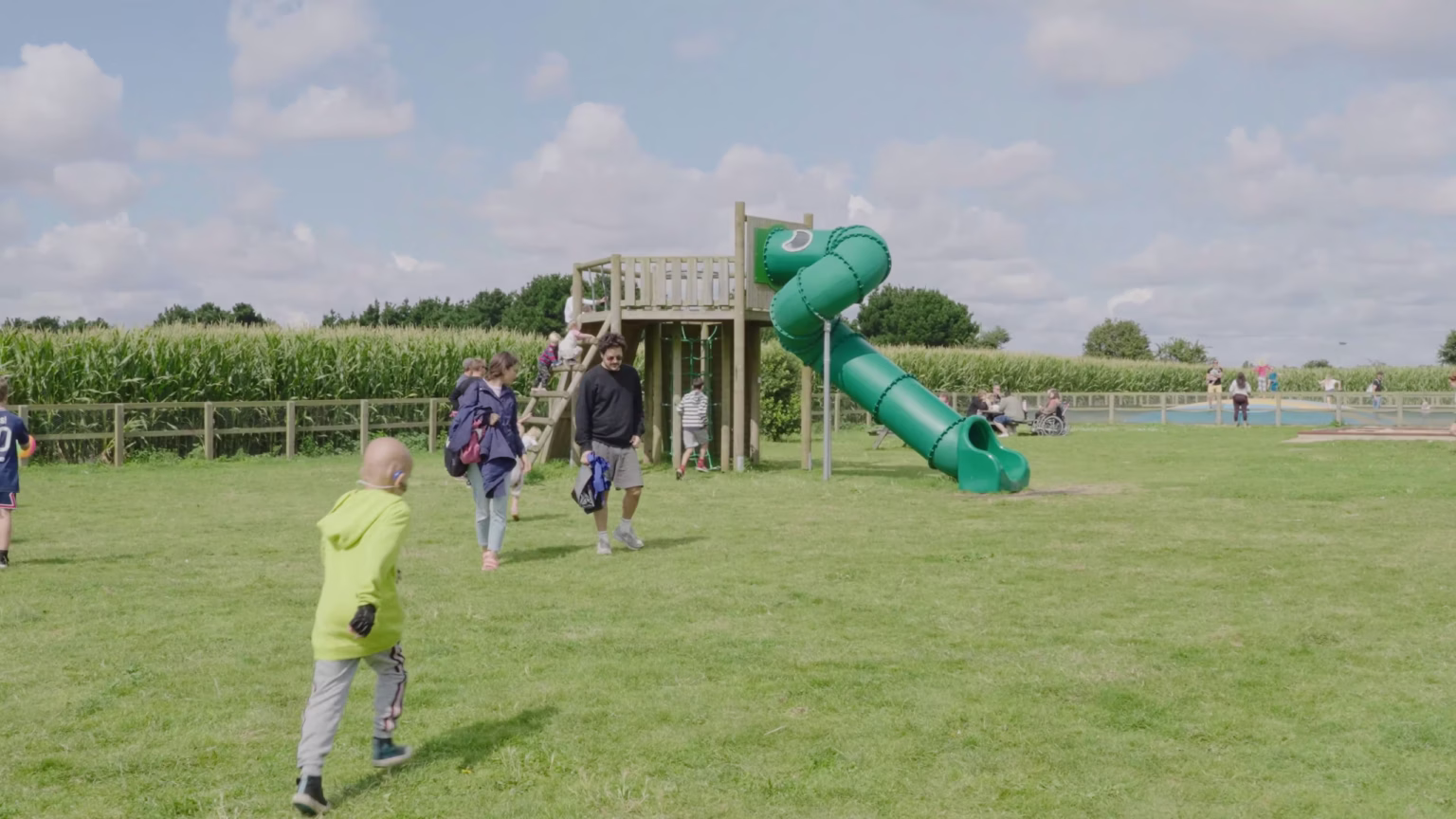 Families arriving at the adventure play area at Southwold Maize Maze